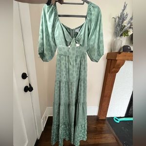 Vestique green satin polka dot dress